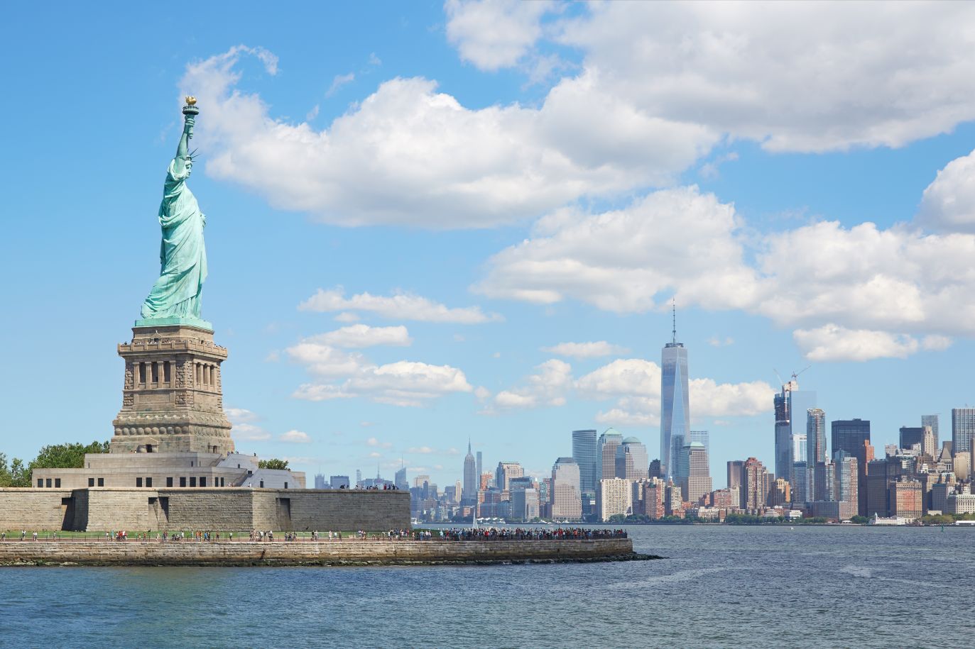 statue-of-liberty-island-and-new-york-city-skyline-2021-08-26-22-35-04-utc